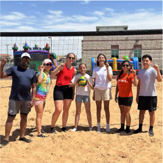 Team having fun playing volleyball