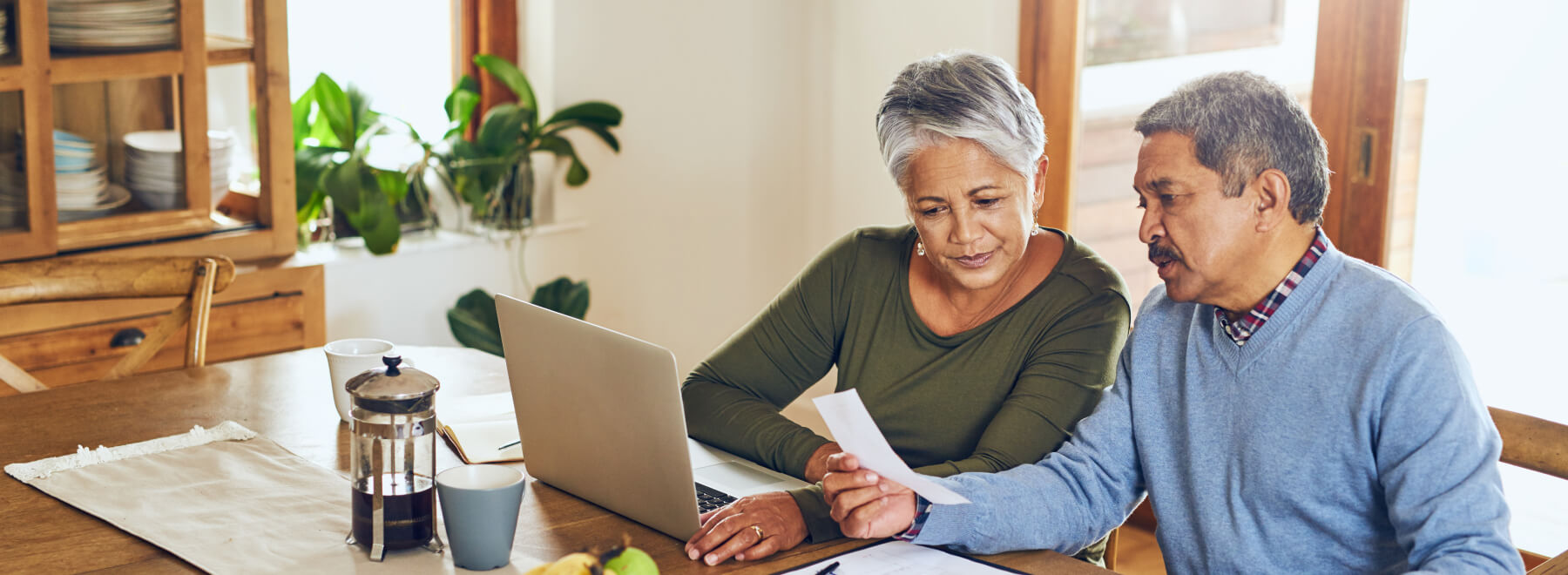 Mature couple discussing finances